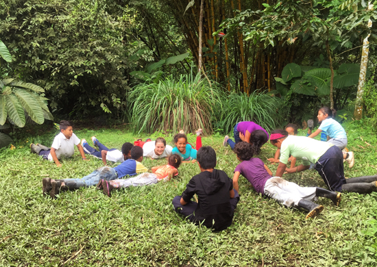 Chelsea teaches youth in Ecuador about metamorphosis through yoga